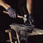 A blacksmith forging a horseshoe at a forge